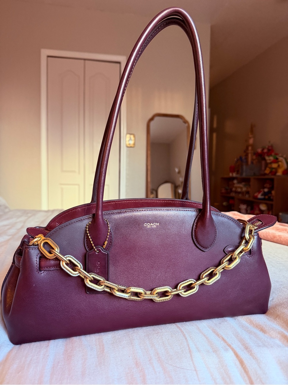 Coach Empire Carry All 34 Merlot with link chain